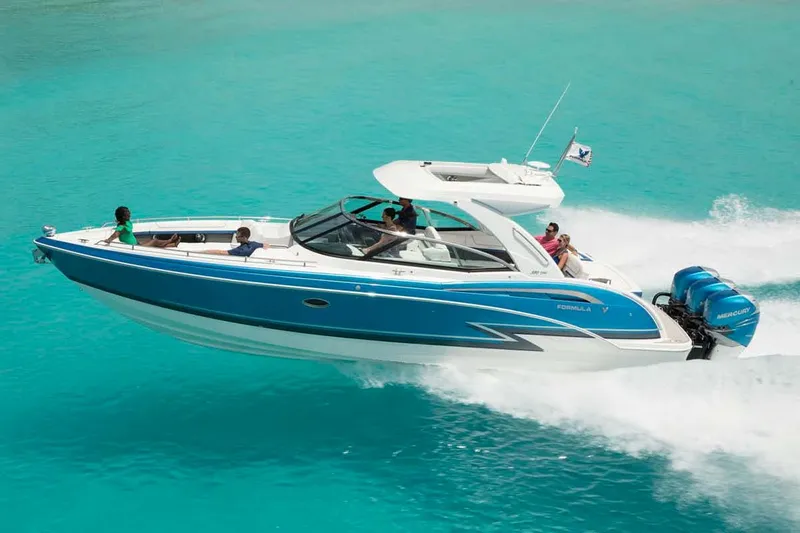 Slide: The Image of 2018 Formula 350 Crossover Bowrider OB cruising on a scenic river. - 7