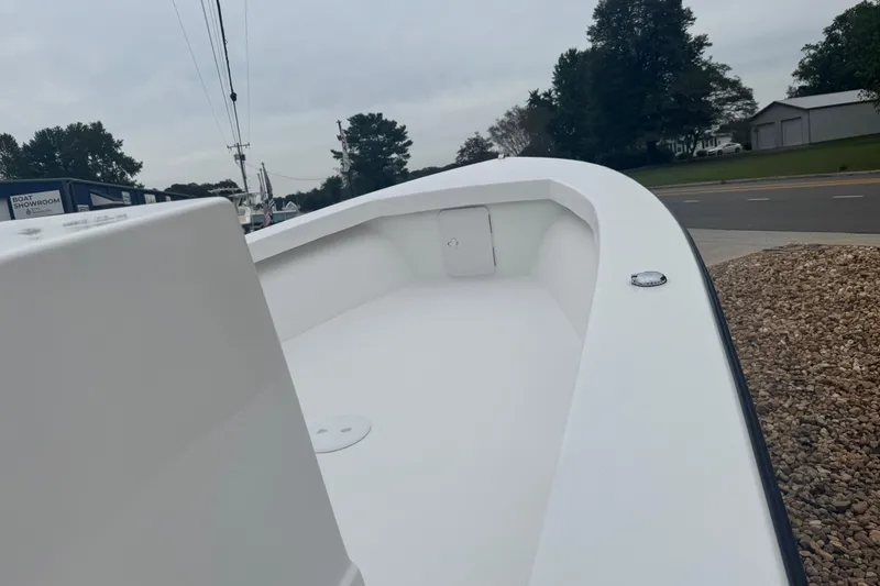 Slide: The Image of 2026 C-Hawk 23 Center Console boat, white deck, outdoor display. - 7