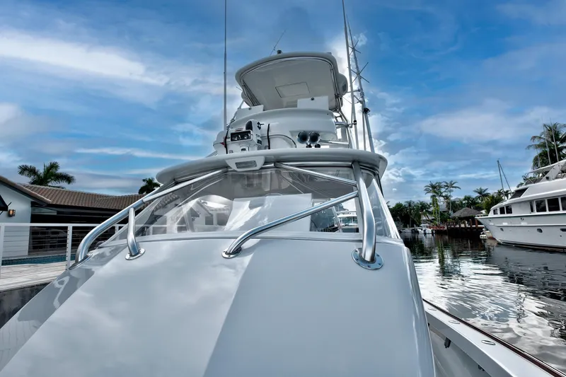 Slide: The Image of 2014 Release Walkaround boat docked, featuring sleek design and clear blue sky backdrop. - 21