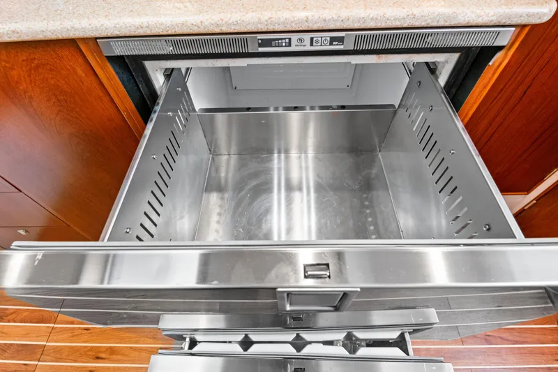 Slide: The Image of Open stainless steel drawer in a 2014 Release Walkaround kitchen. - 44