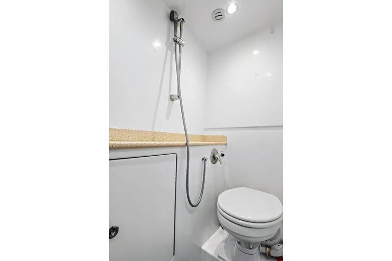 Slide: The Image of Compact bathroom in 2014 Release Walkaround boat with shower and toilet. - 50
