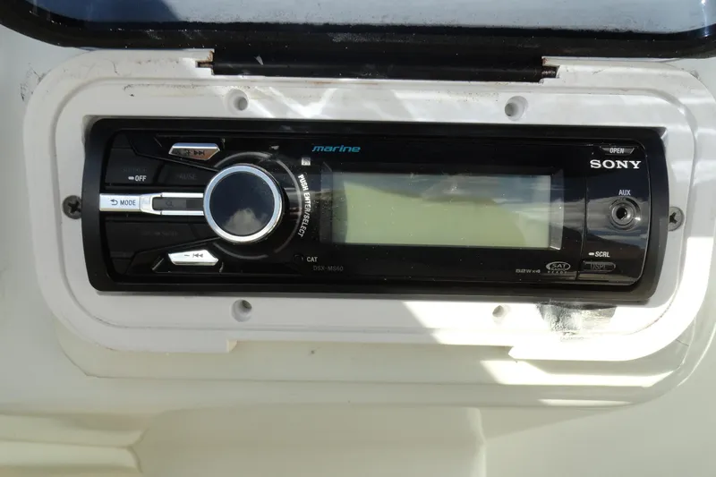 Slide: The Image of Sony marine stereo system in a 1998 Baja 29 Outlaw boat dashboard. - 15