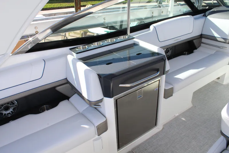 Slide: The Image of 2023 Formula 330 Crossover Bowrider interior with sleek seating and modern amenities. - 30