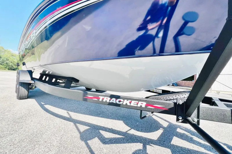 Slide: The Image of 2024 Tracker Targa V-18 Combo boat on trailer, close-up view. - 11