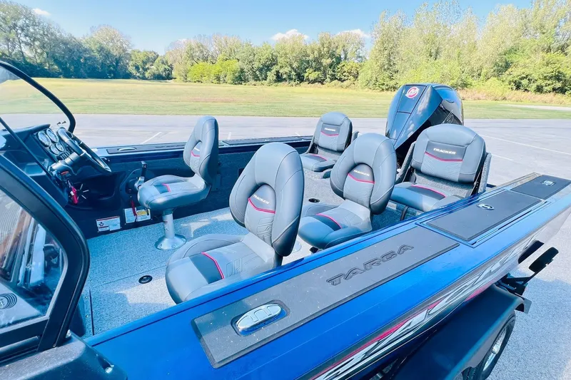 Slide: The Image of 2024 Tracker Targa V-18 Combo boat with sleek seating and modern design. - 15