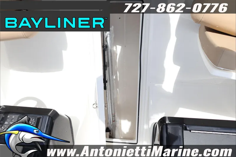 Slide: The Image of 2026 Bayliner V20 boat interior with seating and control panel, Antonietti Marine branding. - 16