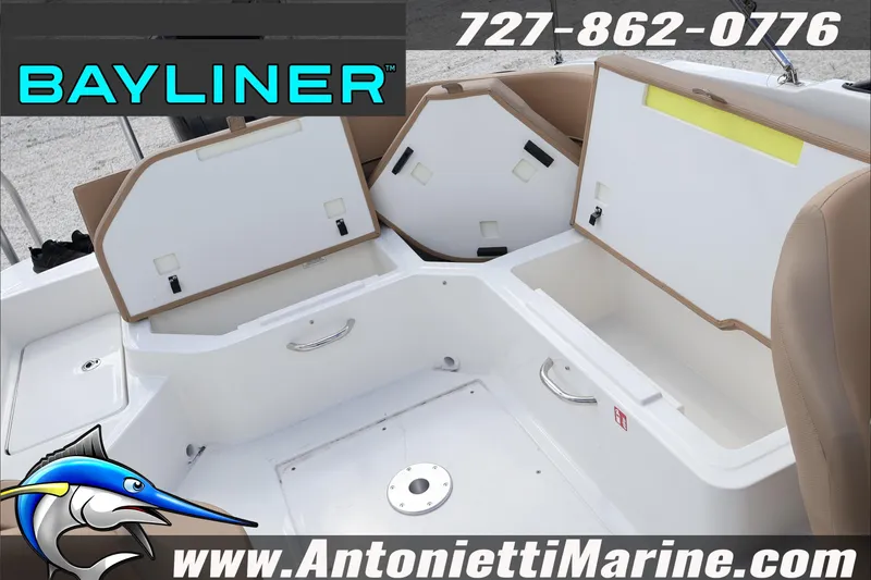 Slide: The Image of Bayliner V20 boat interior with open storage compartments, showcasing modern design. - 30