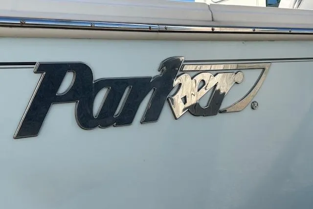 Slide: The Image of Close-up of Parker 2520 XLD Sport Cabin 2020 logo on boat exterior. - 10
