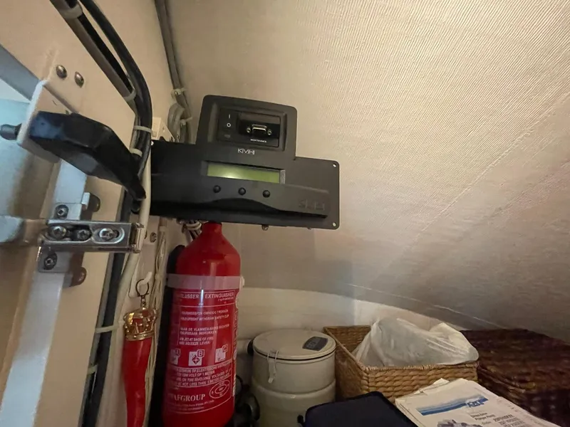 Slide: The Image of Fire extinguisher and equipment inside 2013 Hatteras GT63 yacht interior. - 25