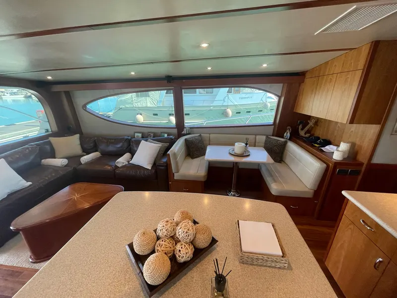 Slide: The Image of Luxurious interior of 2013 Hatteras GT63 yacht with elegant seating and decor. - 30