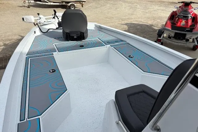 Slide: The Image of 2026 Xpress H22B Bay boat interior with seating and storage compartments. - 13