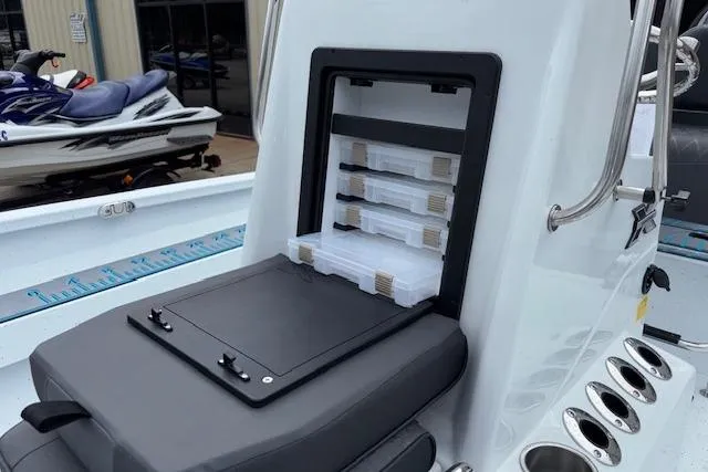 Slide: The Image of 2026 Xpress H22B Bay boat with organized tackle storage and sleek design. - 20