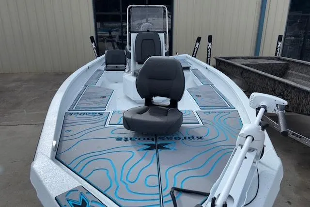 Slide: The Image of 2026 Xpress H22B Bay boat with modern seating and fishing equipment. - 3