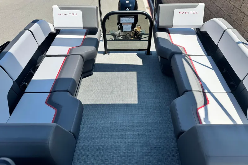 Slide: The Image of 2025 Manitou Cruise 20 pontoon boat interior with stylish seating and modern design. - 12