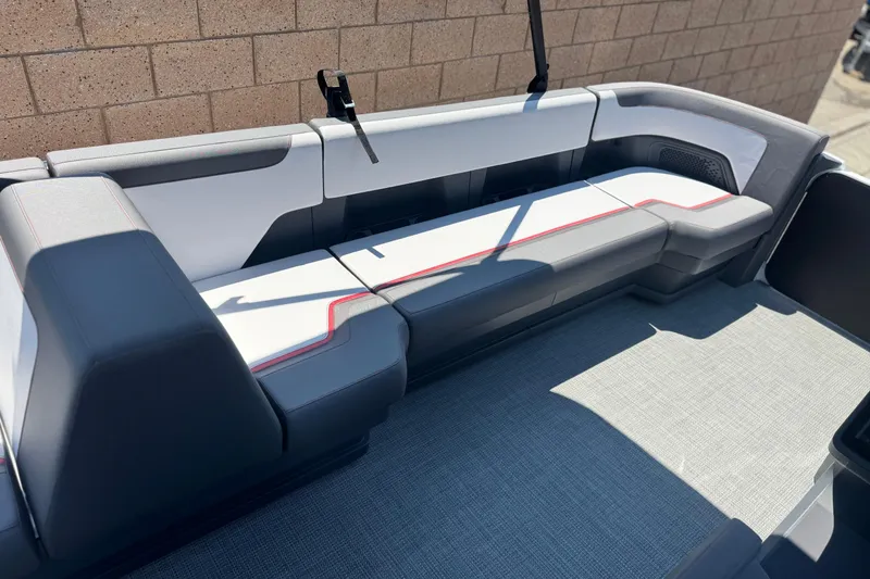 Slide: The Image of 2025 Manitou Cruise 20 boat interior with modern seating and sleek design. - 9