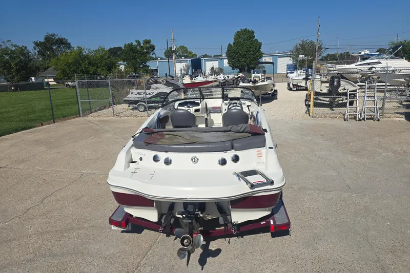 Slide: The Image of 2016 Tahoe 500 TS boat on trailer in outdoor storage area. - 7