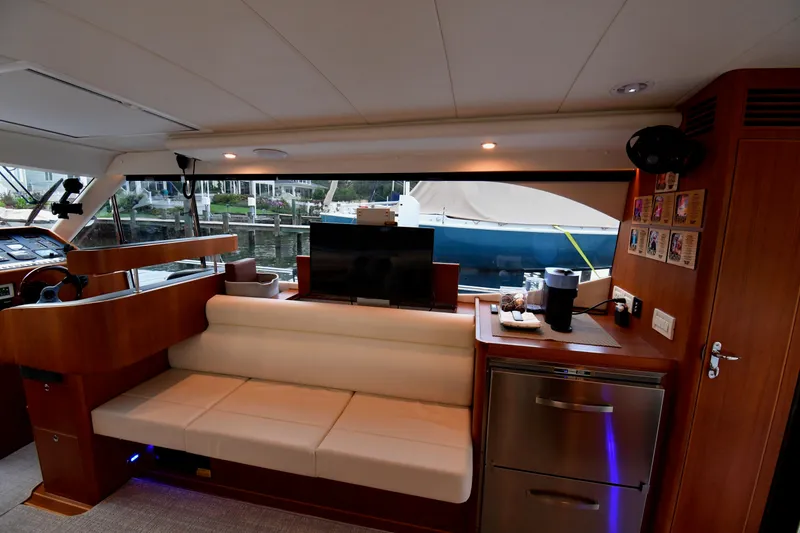 Slide: The Image of Interior of 2021 Hylas M44 yacht with modern seating and kitchenette. - 14