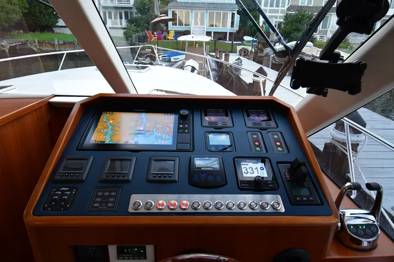 Slide: The Image of Helm of 2021 Hylas M44 yacht with navigation controls and display. - 15