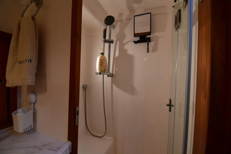Slide: The Image of Shower area in 2021 Hylas M44 yacht with towel and toiletries. - 20