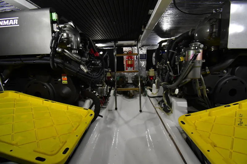 Slide: The Image of Engine room of 2021 Hylas M44 yacht with Yanmar engines and maintenance equipment. - 26