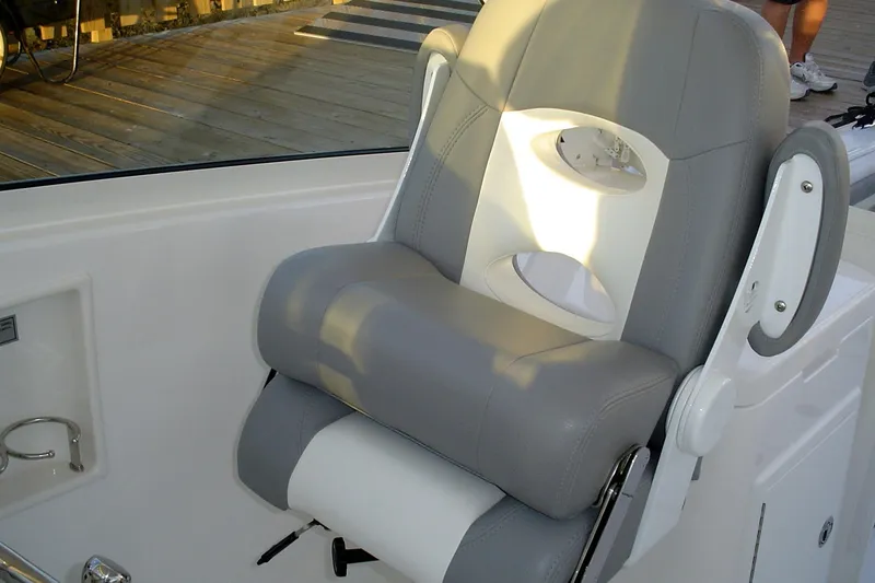 Slide: The Image of 2024 Albemarle 27 Dual Console boat seat with gray and white upholstery. - 11