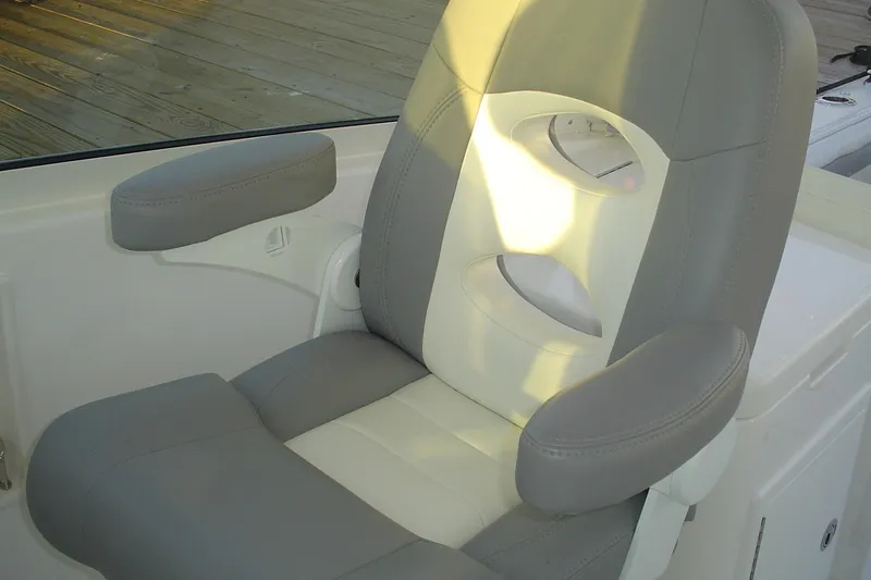Slide: The Image of 2024 Albemarle 27 Dual Console boat seat with gray and white upholstery. - 12