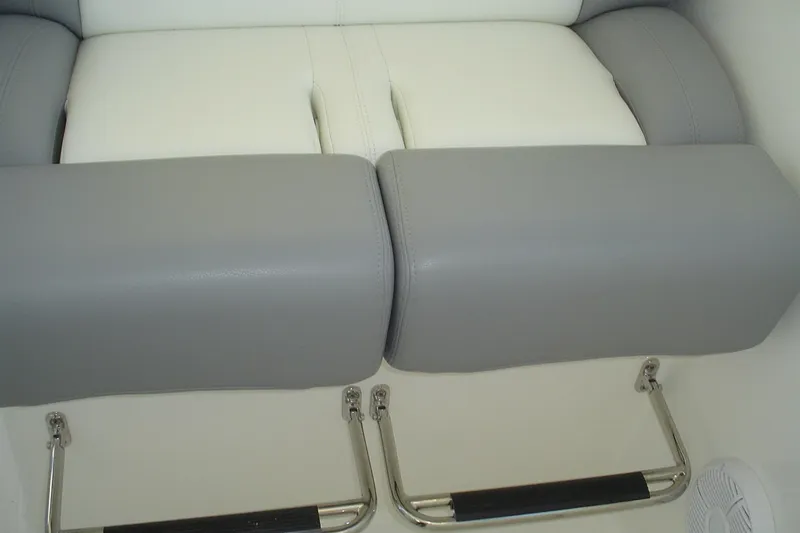 Slide: The Image of 2024 Albemarle 27 Dual Console boat seating with gray and white cushions. - 14