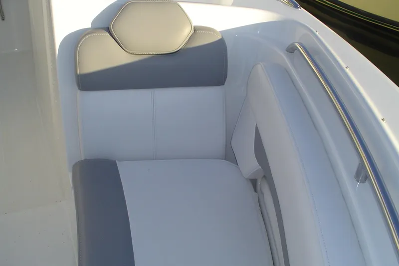 Slide: The Image of 2024 Albemarle 27 Dual Console boat seat with gray and white upholstery. - 30