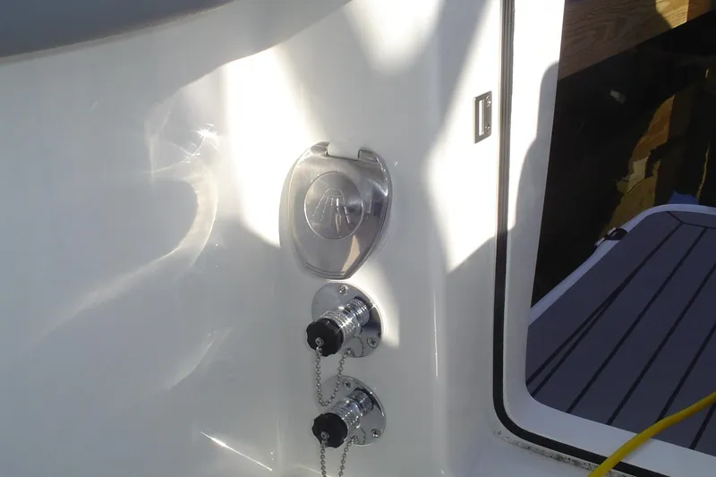 Slide: The Image of 2024 Albemarle 27 Dual Console boat deck with utility connections. - 44