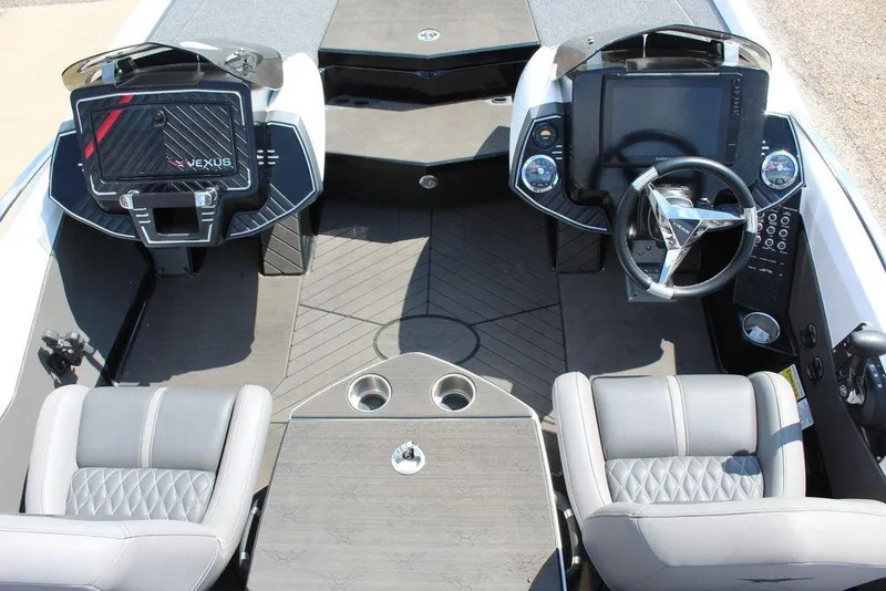 Slide: The Image of 2021 Vexus VX20 boat interior with dual seats, steering wheel, and control panel. - 11