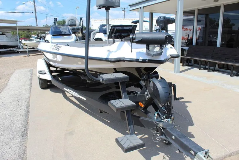 Slide: The Image of 2021 Vexus VX20 boat on trailer, parked outdoors at a dealership. - 15