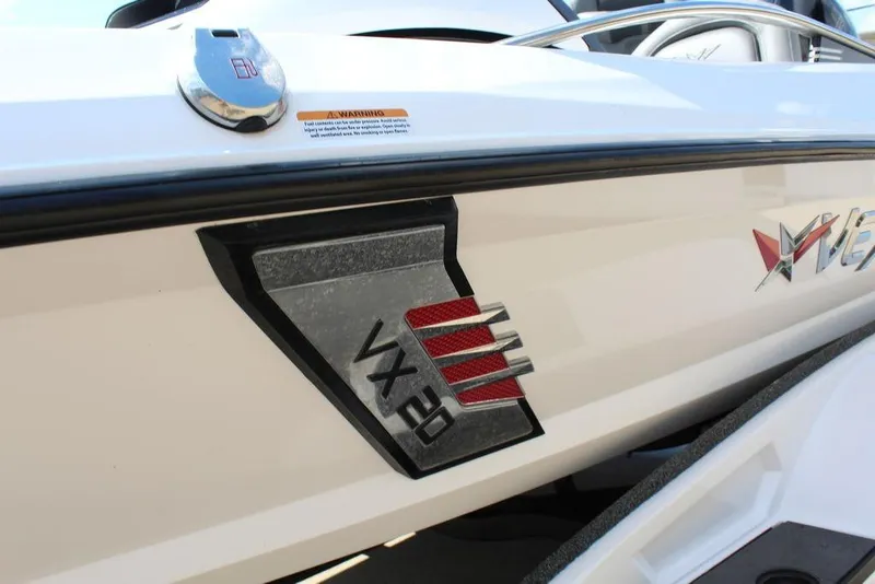 Slide: The Image of 2021 Vexus VX20 boat emblem on white exterior, showcasing sleek design. - 18
