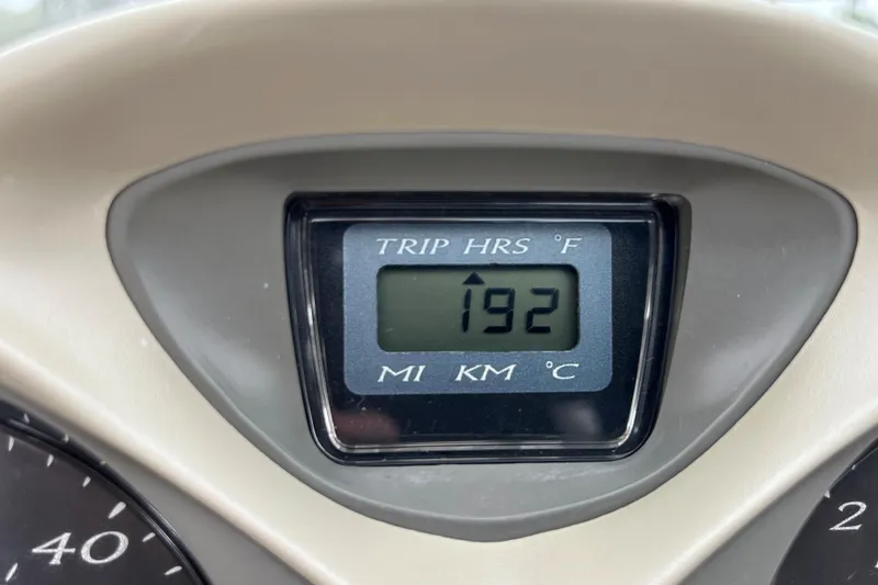 Slide: The Image of Dashboard display of a 2002 Bayliner 195 Capri showing 192 trip hours. - 33