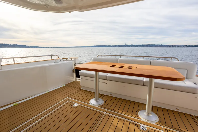 Slide: The Image of Luxury deck of 2023 Greenline 48 Fly yacht with scenic water view. - 20
