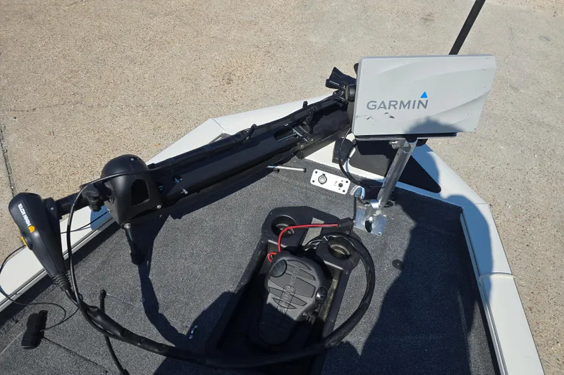 Slide: The Image of 2024 Tracker Pro Team 190 TX boat with Garmin fishfinder and Minn Kota trolling motor. - 10