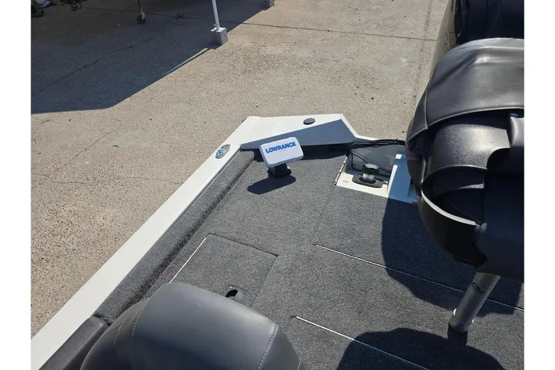 Slide: The Image of 2024 Tracker Pro Team 190 TX boat interior with Lowrance fish finder. - 13