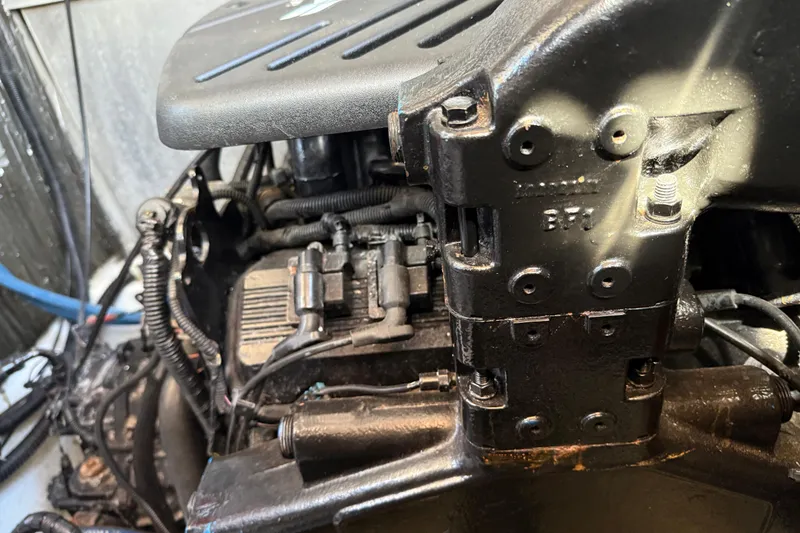 Slide: The Image of Engine compartment of a 1997 Maxum 4100 SCR boat, showcasing mechanical components. - 39