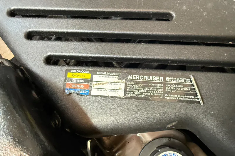 Slide: The Image of 1997 Maxum 4100 SCR engine label showing MerCruiser specifications and color-coded fluid information. - 41