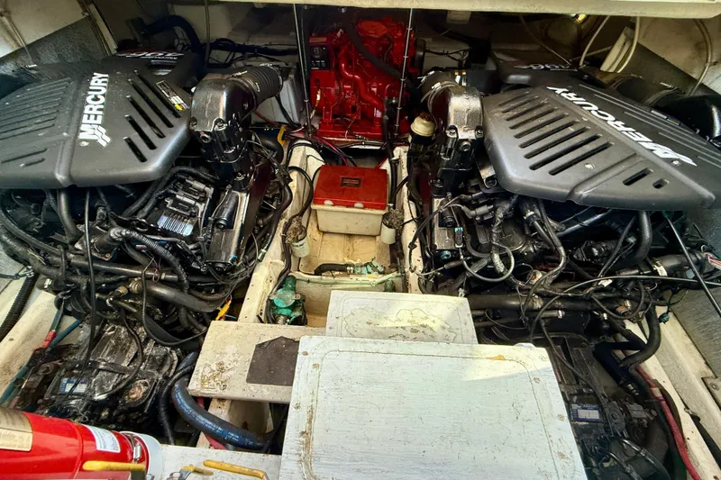 Slide: The Image of Engine room of a 1997 Maxum 4100 SCR with dual Mercury engines. - 47