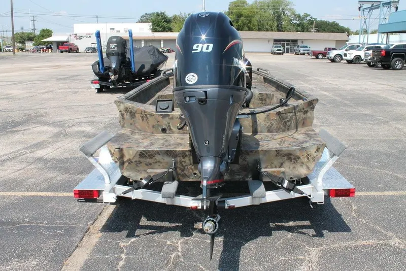 Slide: The Image of 2026 Excel 1854 F4 Shallow Water boat with 90 HP motor on trailer. - 8