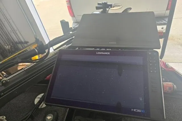 Slide: The Image of 2023 Nitro Z21 XL Pro with Lowrance HDS display in a boat cockpit. - 11