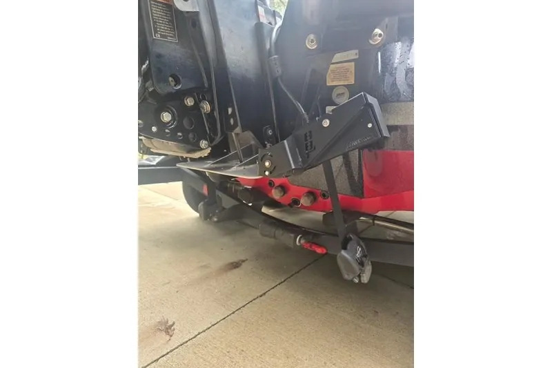 Slide: The Image of 2023 Nitro Z21 XL Pro boat motor mount detail on concrete surface. - 13