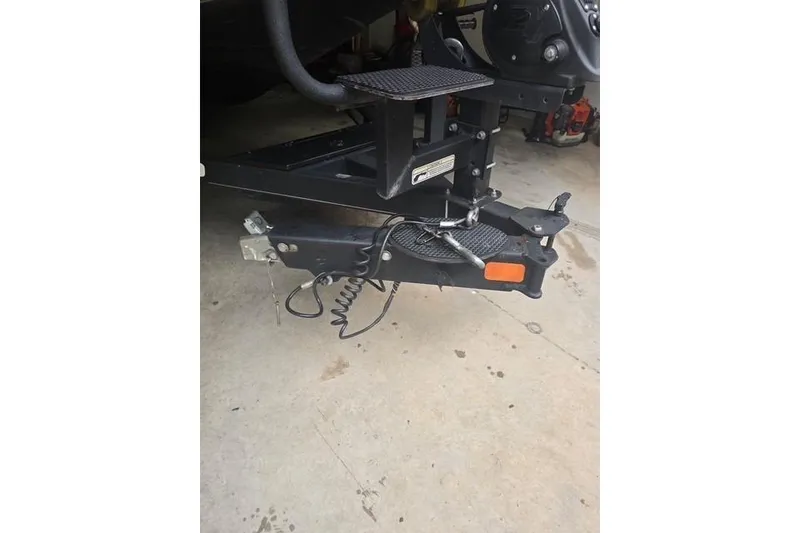 Slide: The Image of Trailer hitch of a 2023 Nitro Z21 XL Pro boat on concrete floor. - 4