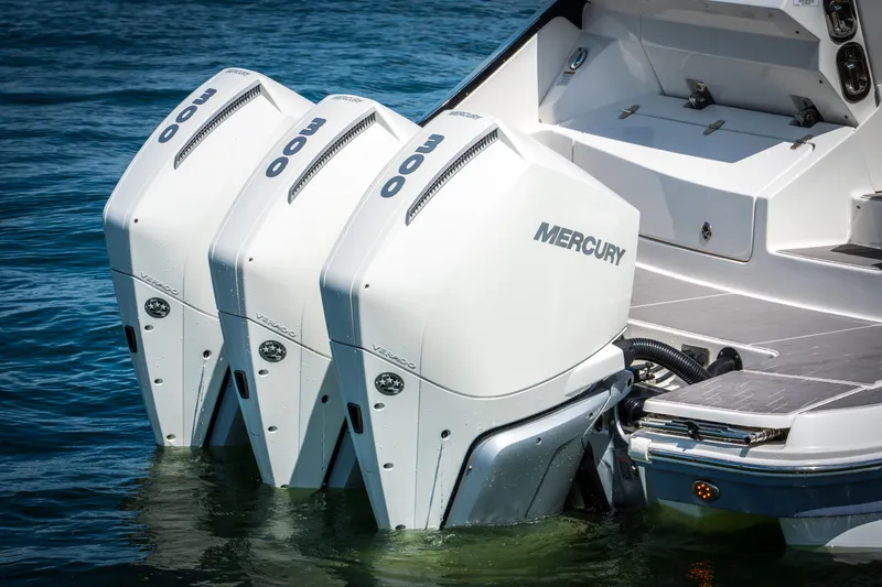 Slide: The Image of 2023 Sea Ray Sundancer 370 OB with triple Mercury outboard engines. - 10