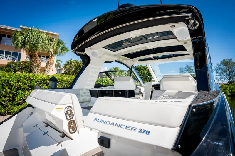 Slide: The Image of 2023 Sea Ray Sundancer 370 OB luxury boat with sleek design and spacious seating. - 15