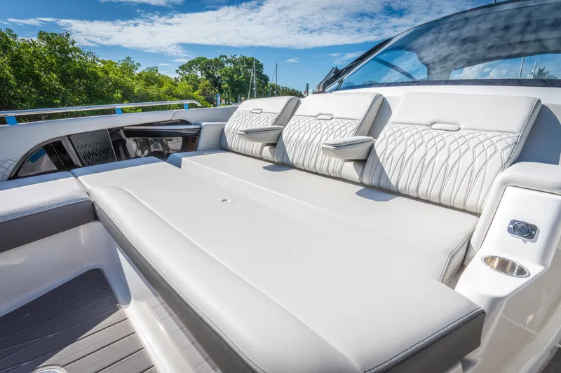 Slide: The Image of 2023 Sea Ray Sundancer 370 OB luxury boat seating area with modern design. - 28