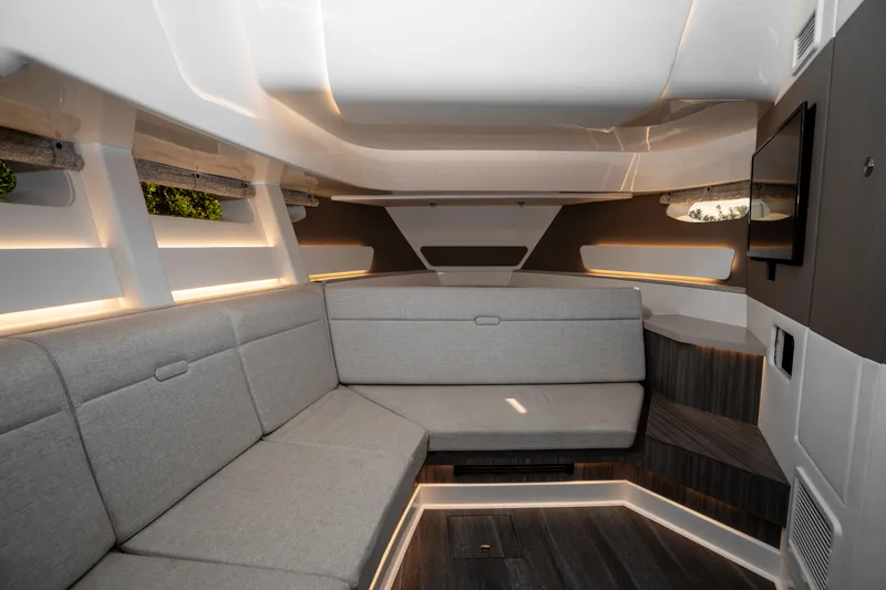 Slide: The Image of Modern interior of 2023 Sea Ray Sundancer 370 OB with sleek seating and ambient lighting. - 30