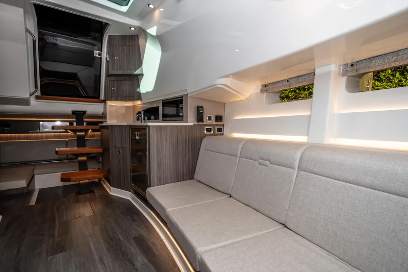 Slide: The Image of Interior of 2023 Sea Ray Sundancer 370 OB, featuring modern design and comfortable seating. - 32