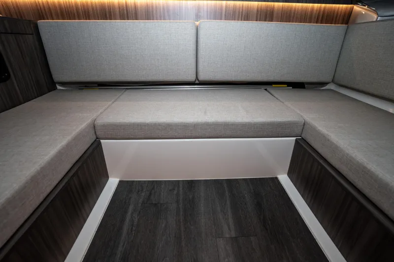 Slide: The Image of Interior seating area of 2023 Sea Ray Sundancer 370 OB with modern grey upholstery. - 35