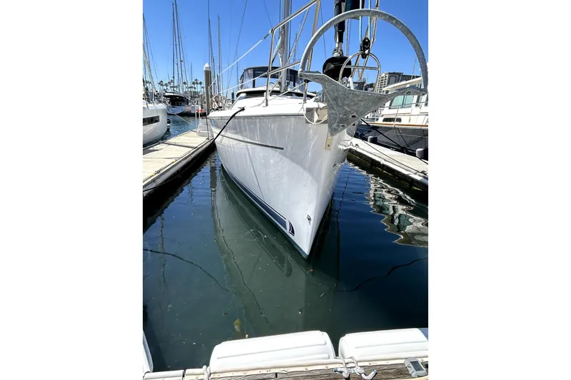 Slide: The Image of 2007 Hunter 41 Deck Salon yacht docked at marina, side view. - 1